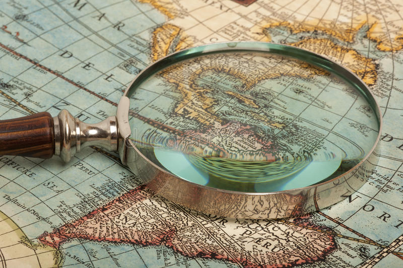 magnifying-glass-map-ancient-old-51308672.jpg